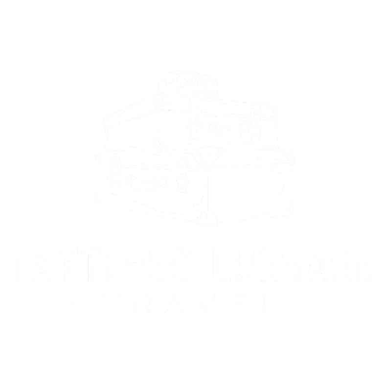 Tattered Luggage Travel Logo