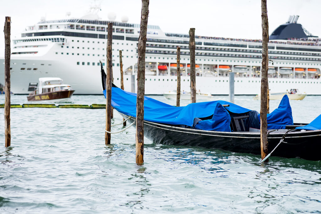 Gondola with cruise ship in the background