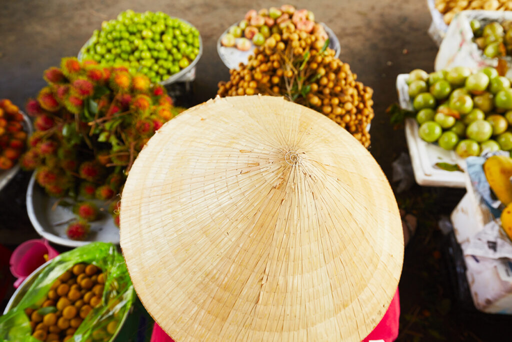 Vietnamese woman on the street market
