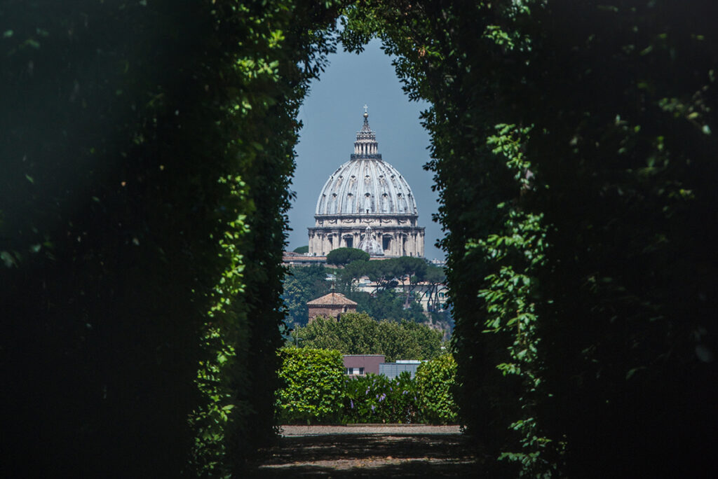 The dome of Saint Peters Basilica seen through the famous keyhole on Aventine Hill