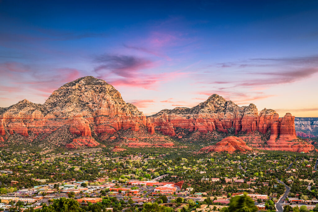 Sedona, Arizona, USA downtown and mountains.