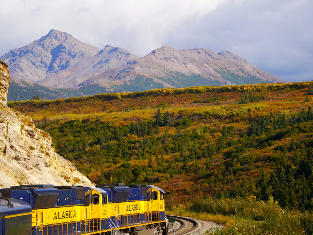 Alaska Railroad train against the beautiful backdrop of Denali
